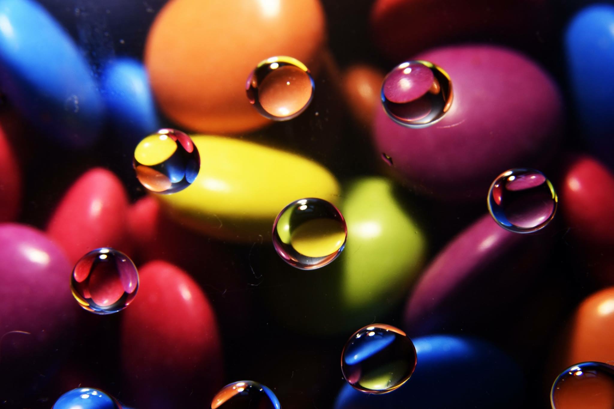 Colourful abstract Focus Matters signature image with light, colour and water droplets