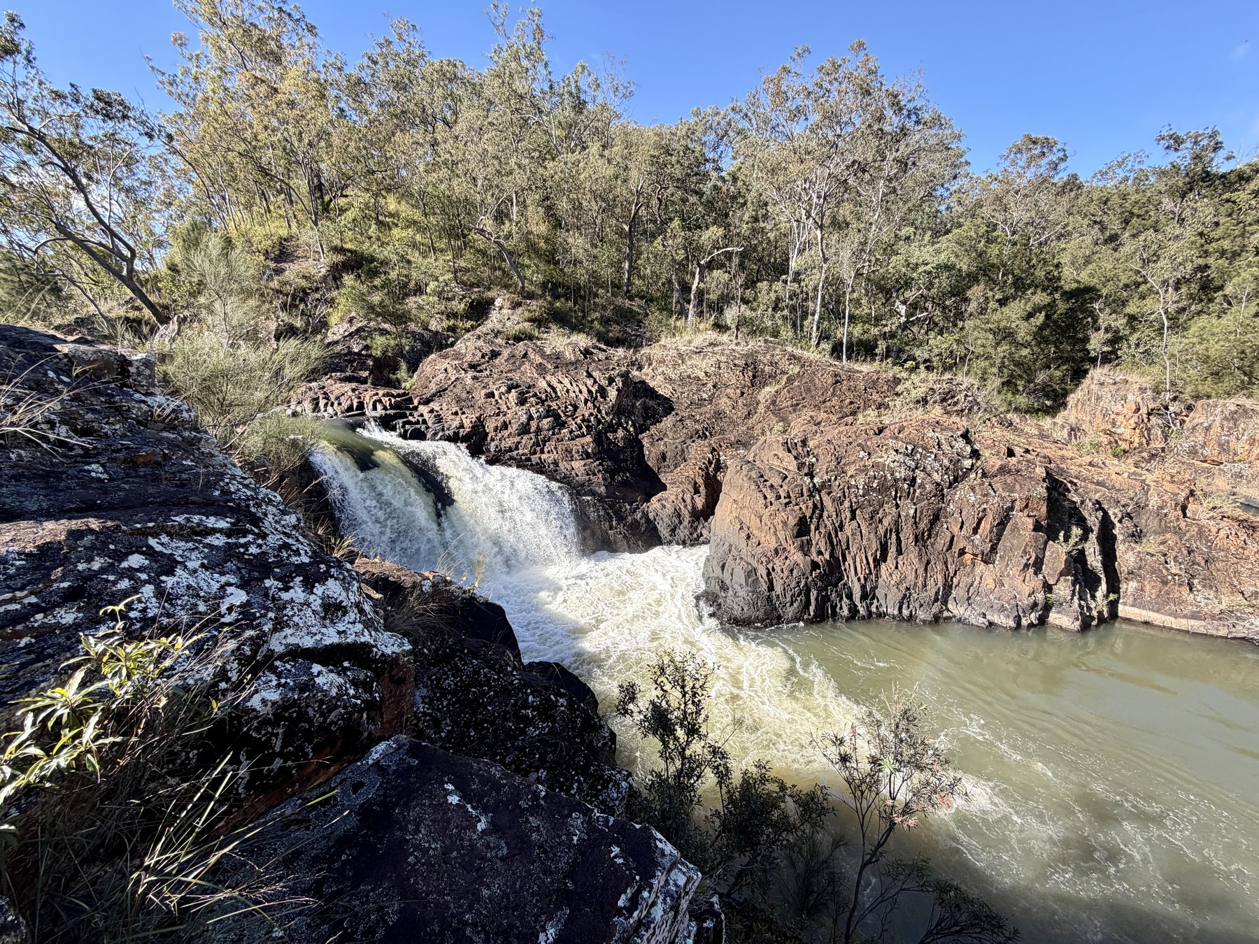 Water rushing through rocky falls at the Army Swimming Hole