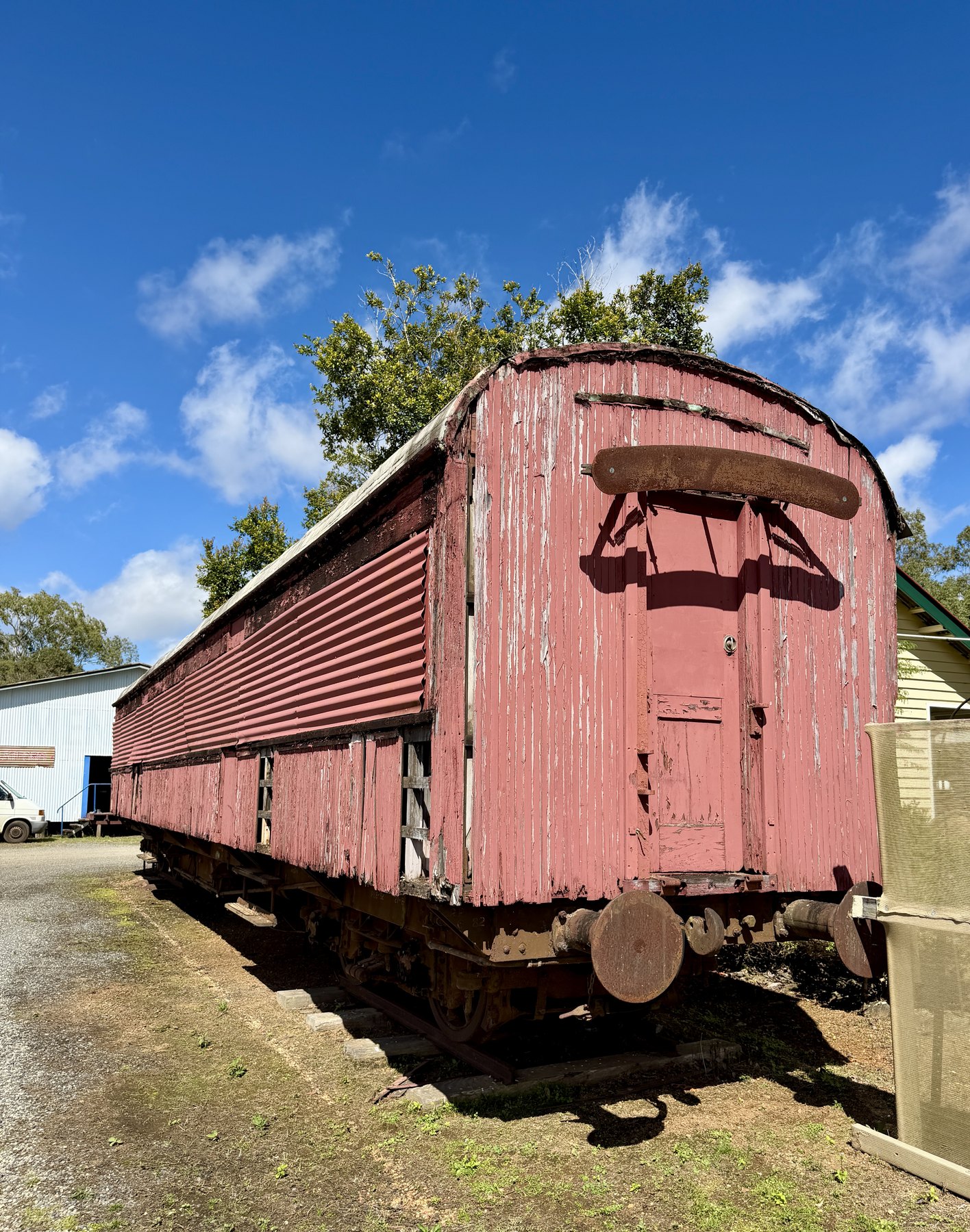 Historic red railway carriage in Ravenshoe