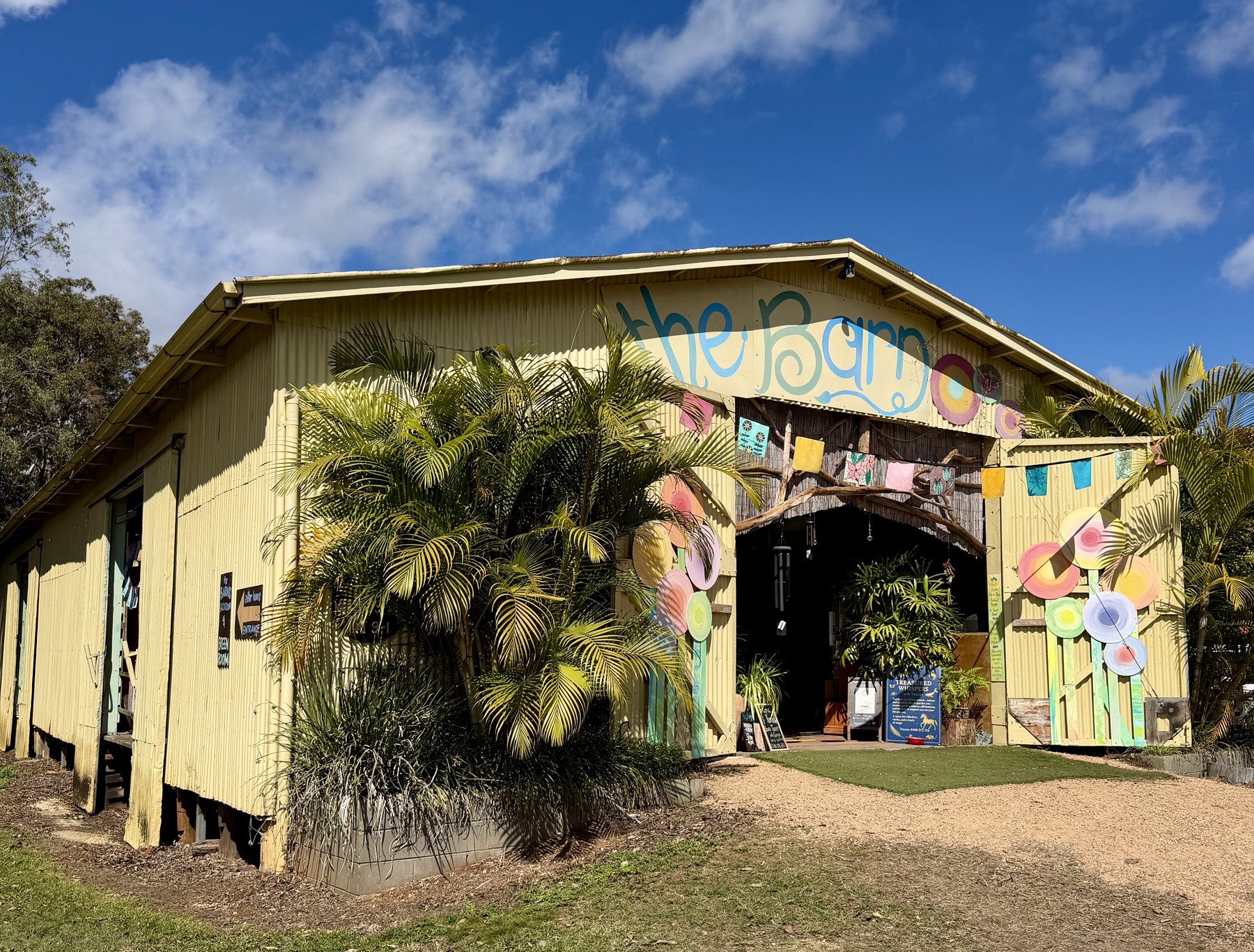 The Barn shopfront in Ravenshoe with colourful decorations