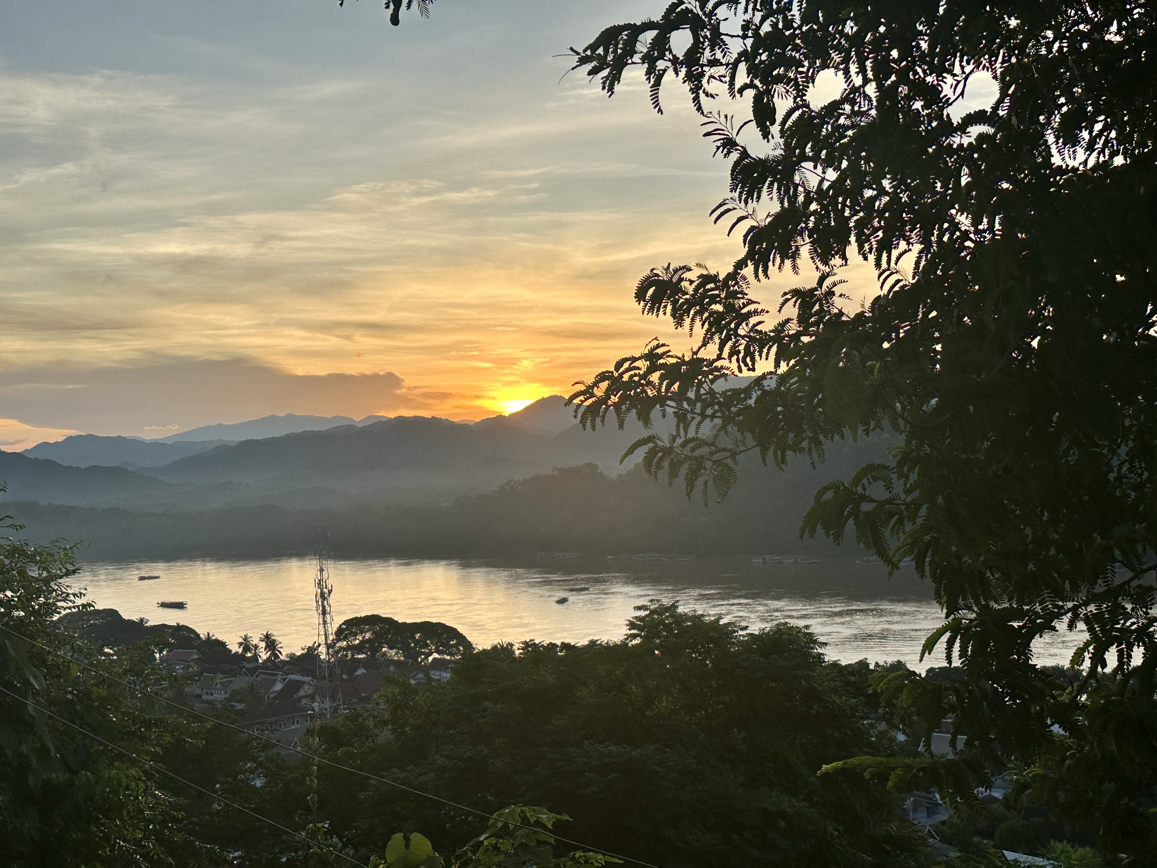 Sunrise over the Mekong River and Luang Prabang mountains